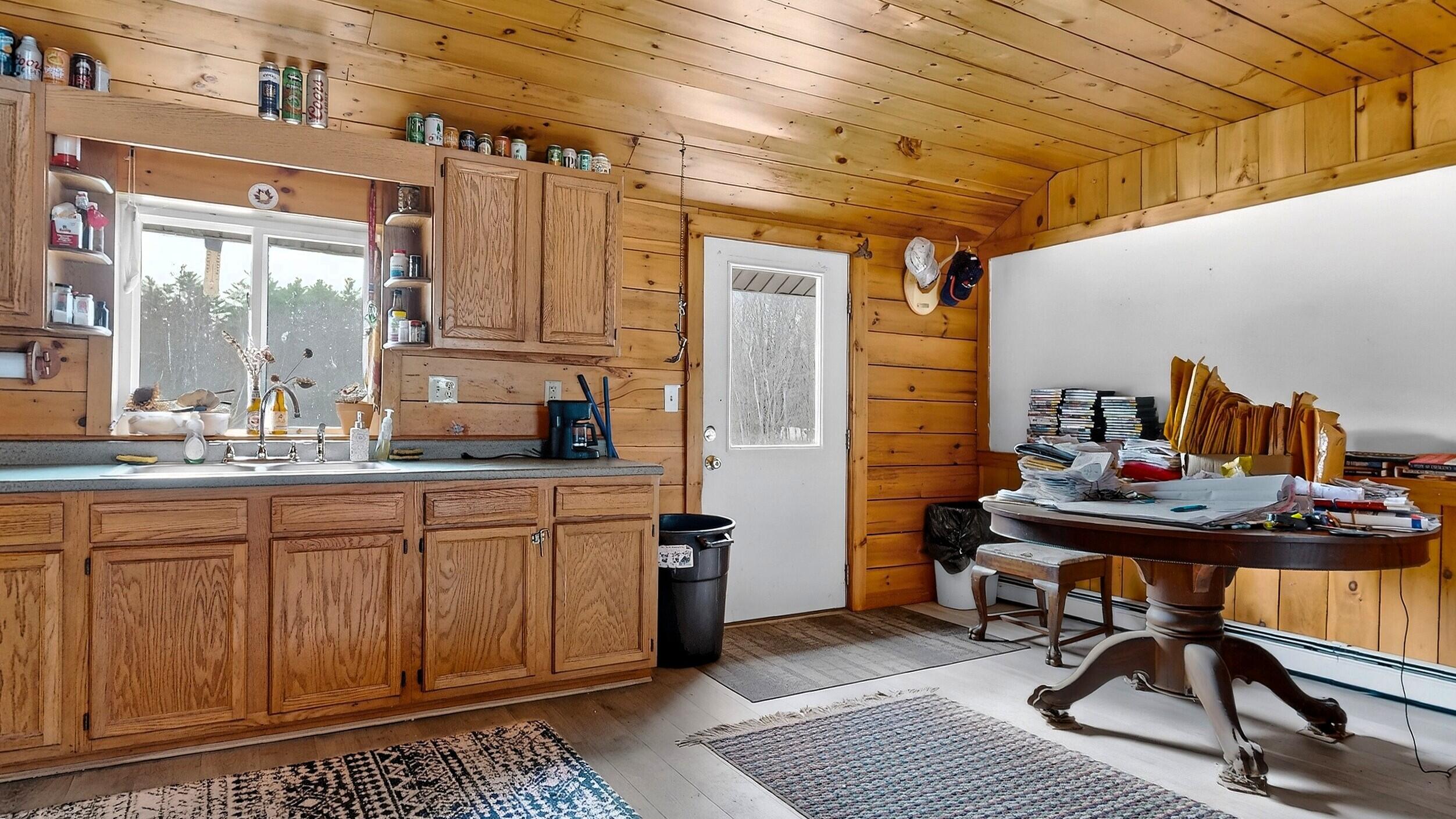 69 Old Orchard Road Buxton, ME 04093 - Photo 29 of 54 kitchen w/ door to overlook deck