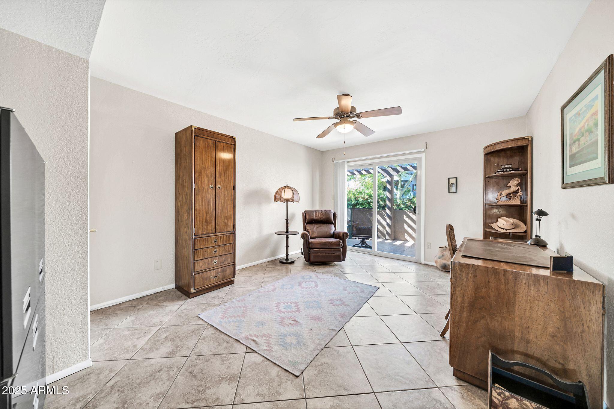25621 Cordova Lane Rio Verde, AZ 85263 - Photo 19 of 42 a living room with furniture and a window