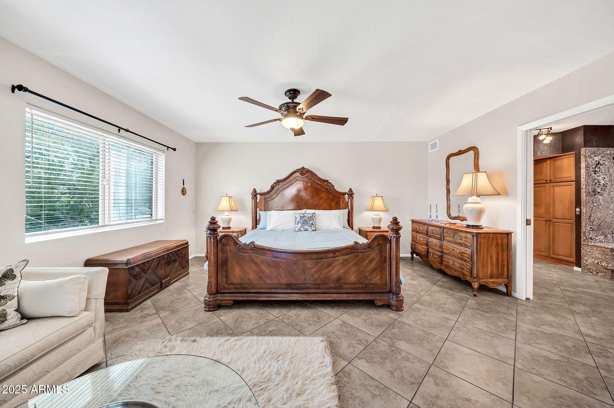 25621 Cordova Lane Rio Verde, AZ 85263 - Photo 24 of 42 a living room with furniture and a large window