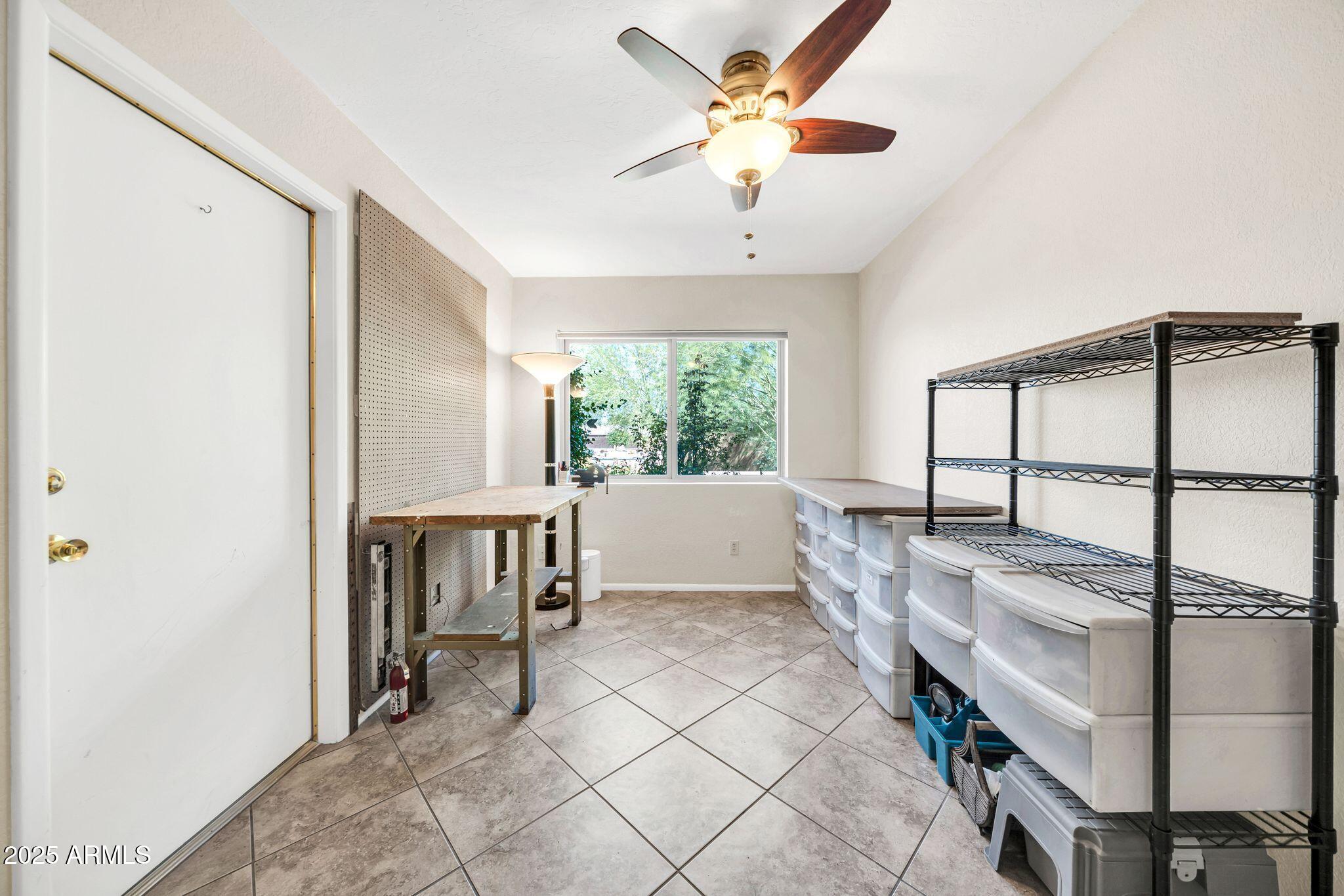25621 Cordova Lane Rio Verde, AZ 85263 - Photo 33 of 42 a view of an entryway with a workspace