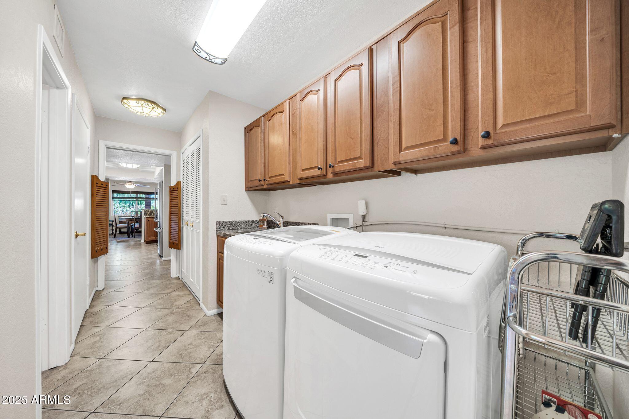 25621 Cordova Lane Rio Verde, AZ 85263 - Photo 34 of 42 a utility room with dryer and washer