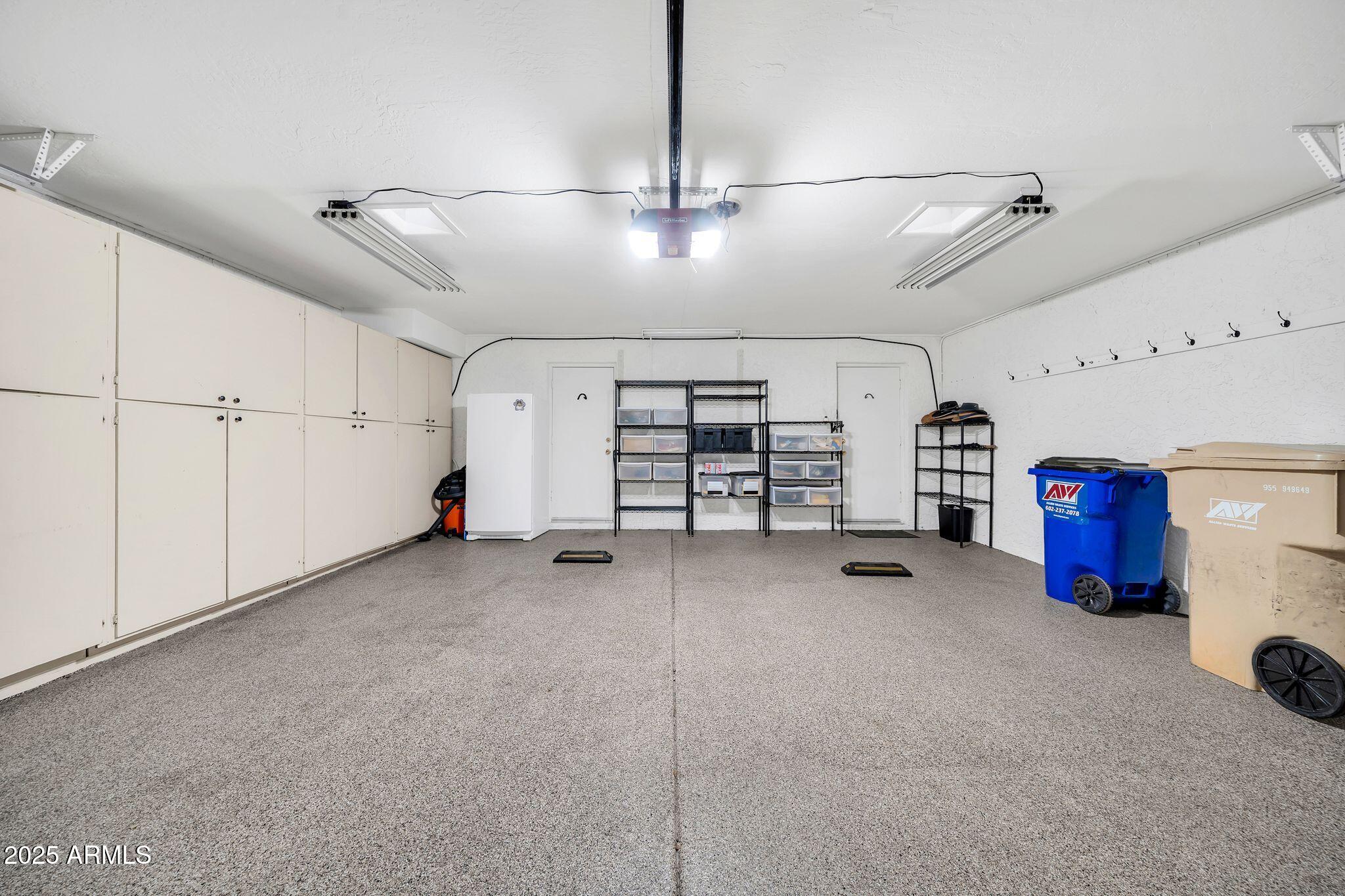 25621 Cordova Lane Rio Verde, AZ 85263 - Photo 36 of 42 a view of a storage & utility room with a ceiling fan