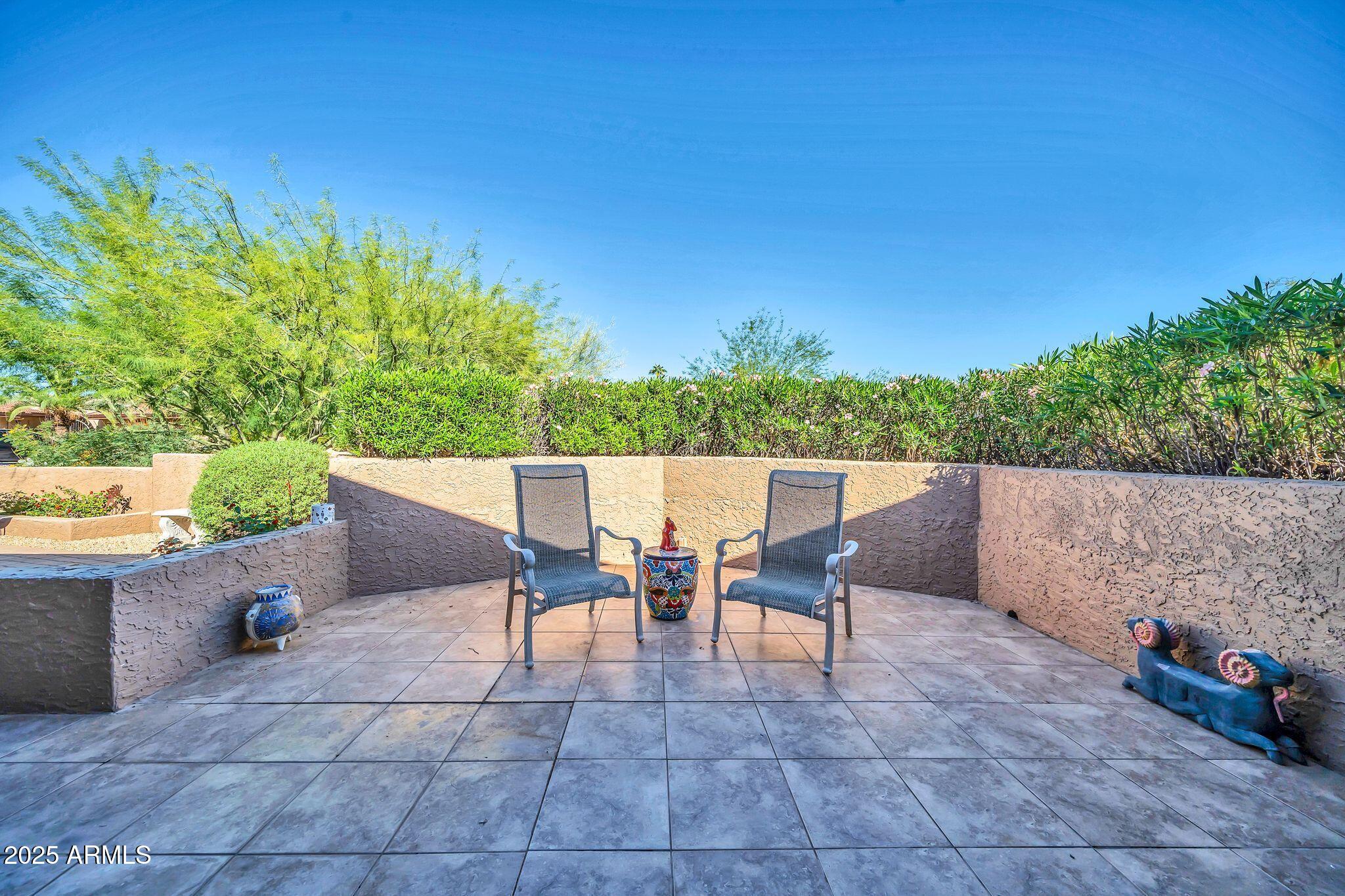 25621 Cordova Lane Rio Verde, AZ 85263 - Photo 40 of 42 a patio with table and chairs