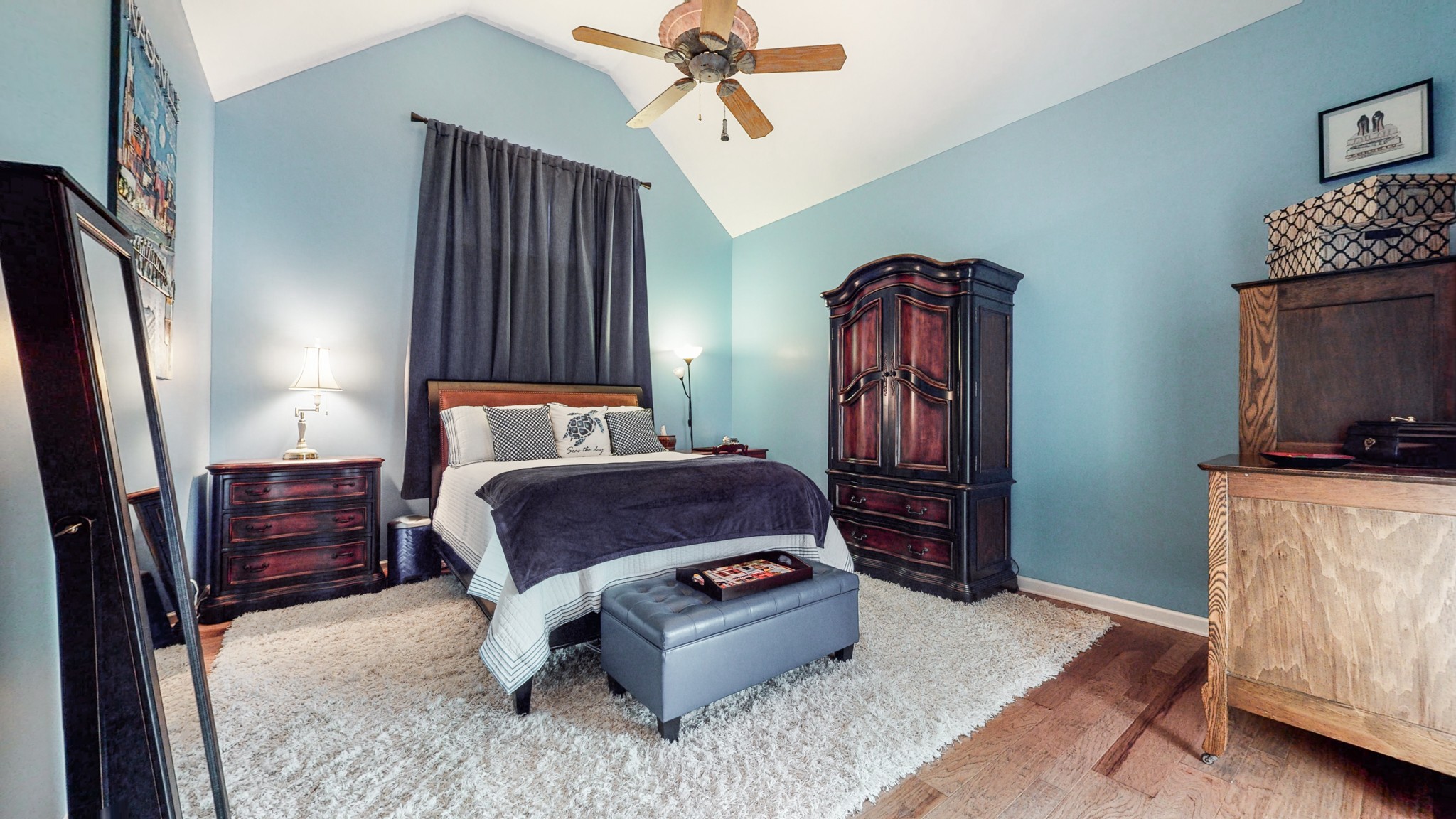 2332 Armstrong Valley Road Murfreesboro, TN 37128 - Photo 16 of 46 a bedroom with a bed dresser and wooden floor