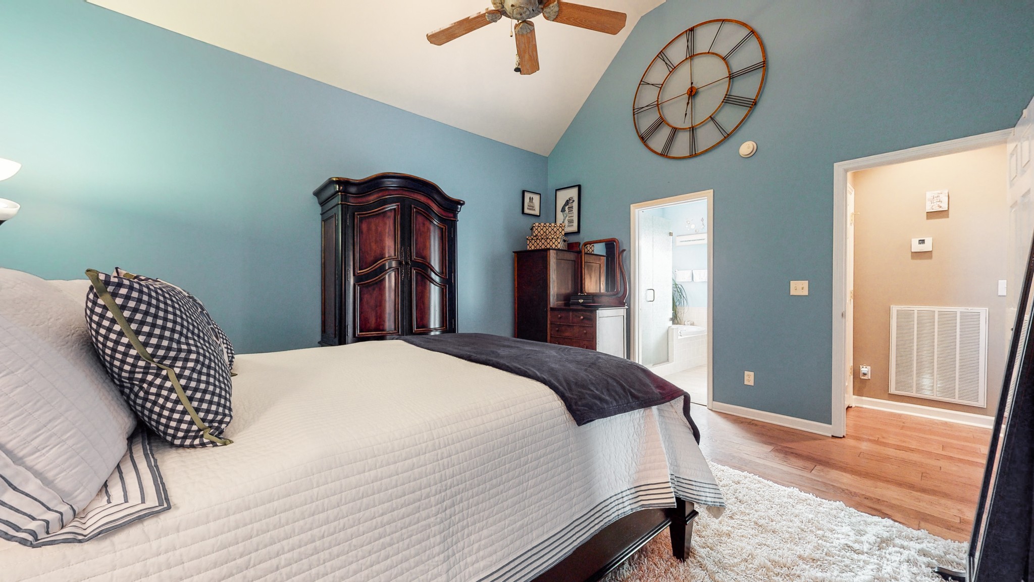 2332 Armstrong Valley Road Murfreesboro, TN 37128 - Photo 17 of 46 a bedroom with a bed and a chandelier