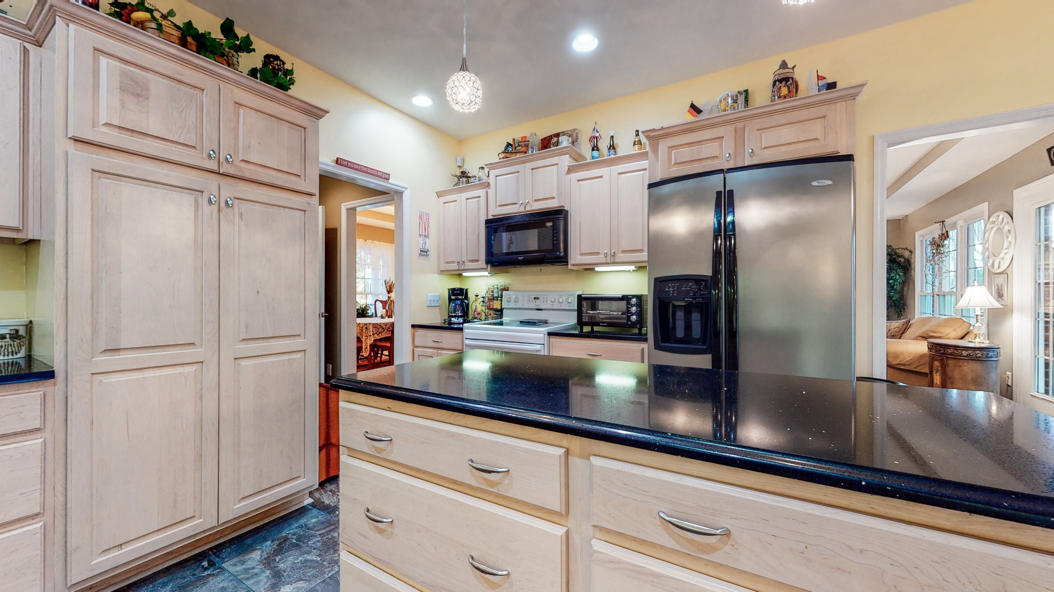 2332 Armstrong Valley Road Murfreesboro, TN 37128 - Photo 22 of 46 a kitchen with stainless steel appliances granite countertop a refrigerator a stove and a sink with wooden floor