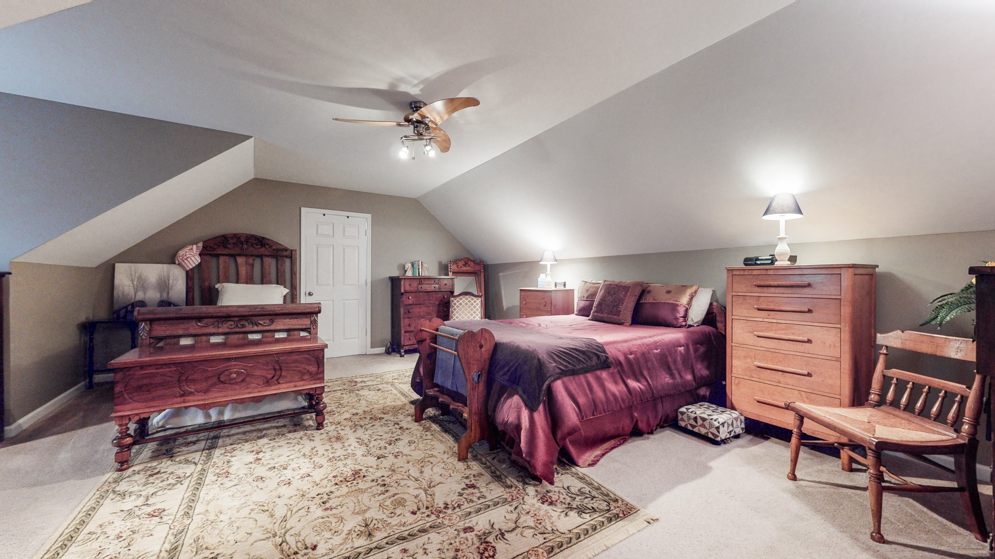 2332 Armstrong Valley Road Murfreesboro, TN 37128 - Photo 30 of 46 a spacious bedroom with a bed a chandelier and closet