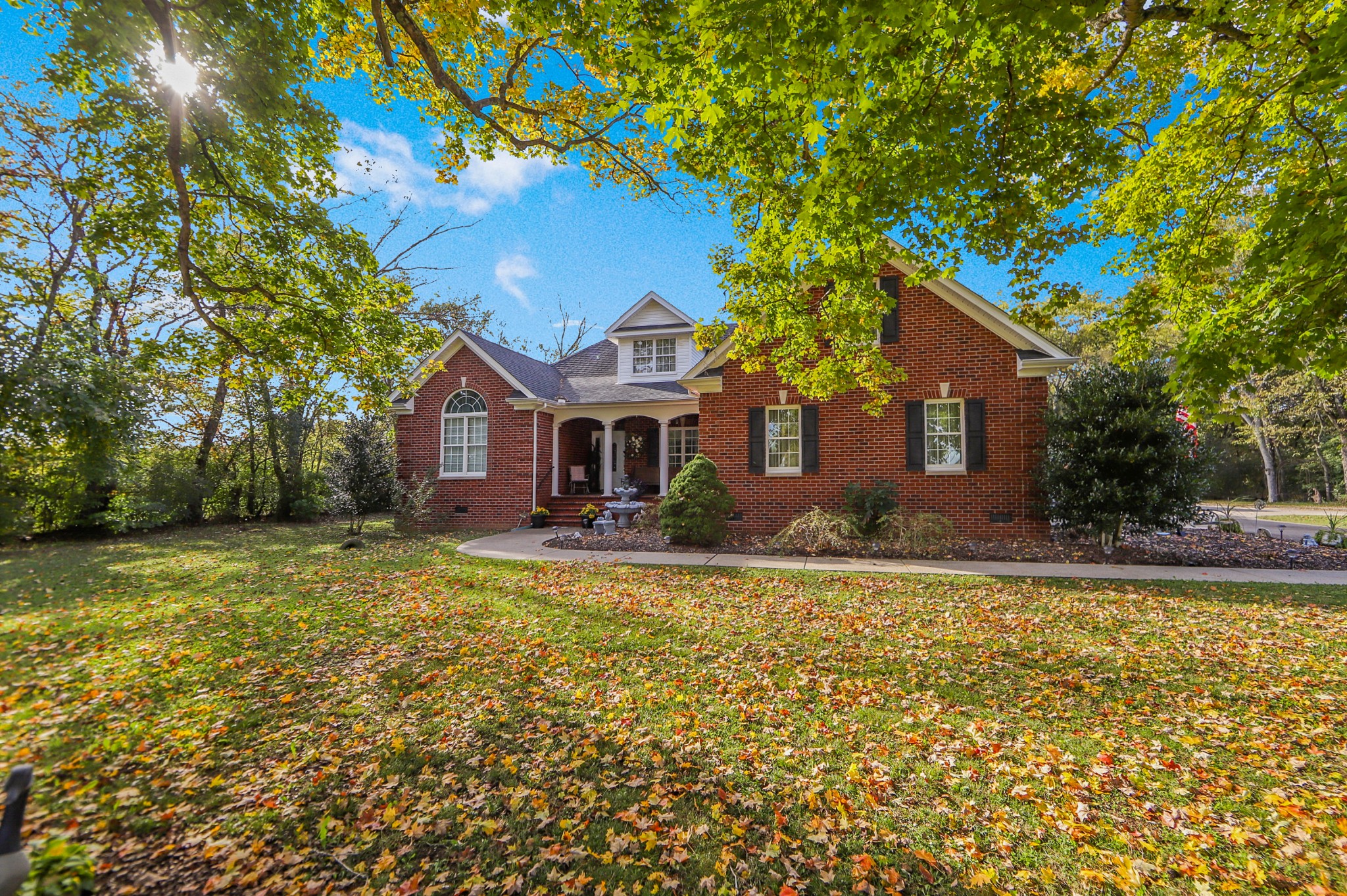 2332 Armstrong Valley Road Murfreesboro, TN 37128 - Photo 5 of 46 a front view of a house with a garden