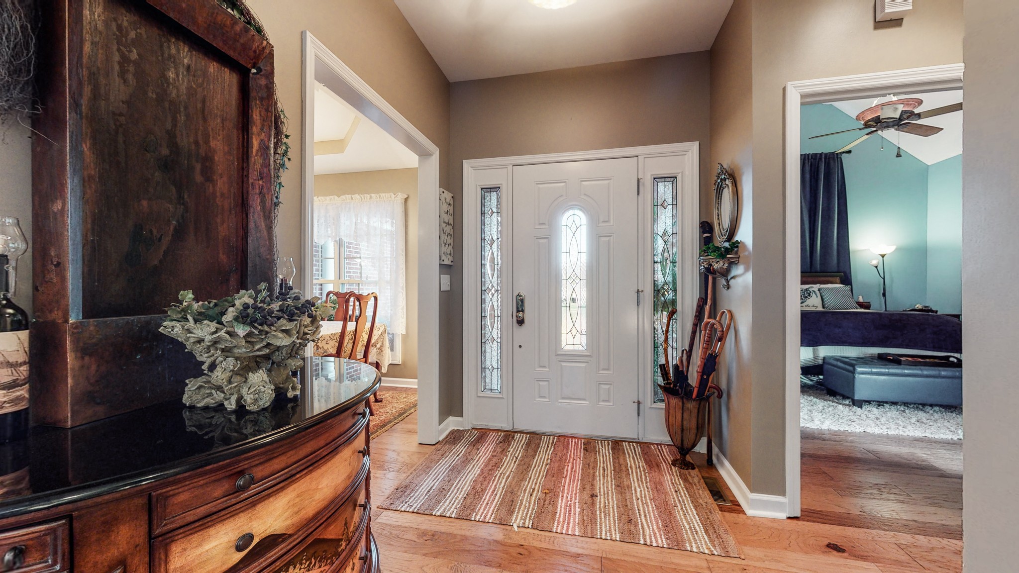 2332 Armstrong Valley Road Murfreesboro, TN 37128 - Photo 10 of 46 a view of a hallway and a livingroom with furniture