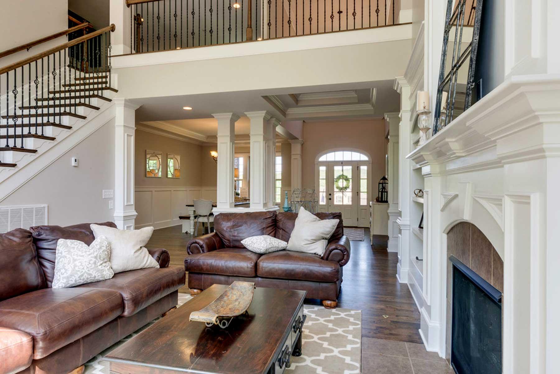 3421 Herbert Drive Franklin, TN 37067 - Photo 12 of 30 a living room with furniture a fireplace and a large window