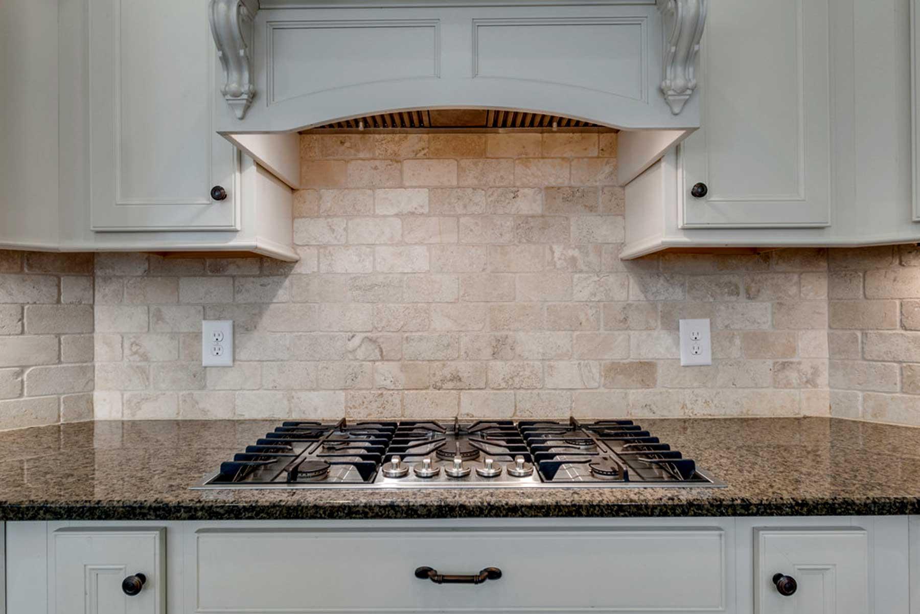 3421 Herbert Drive Franklin, TN 37067 - Photo 19 of 30 a kitchen with granite countertop white cabinets and a stove