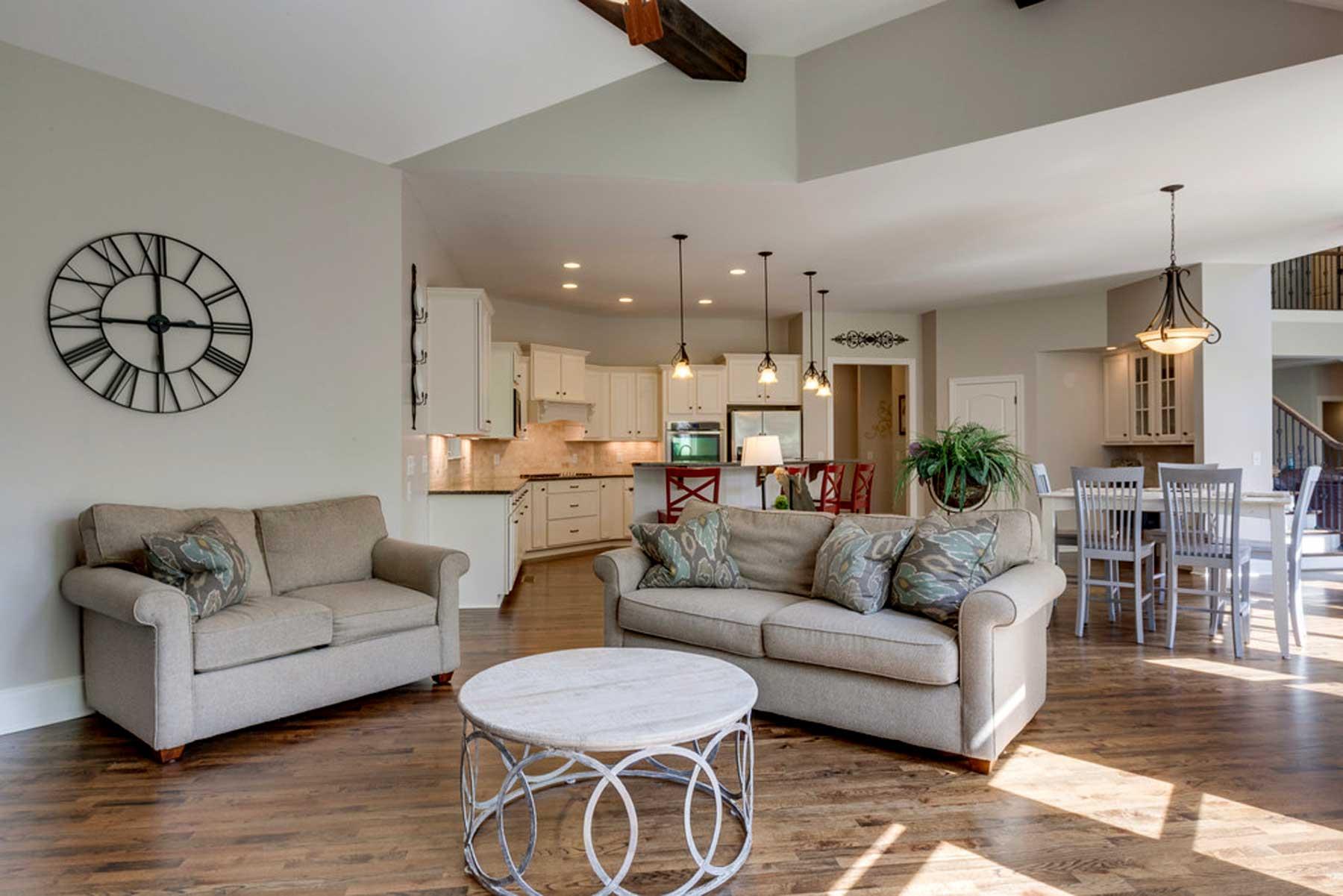 3421 Herbert Drive Franklin, TN 37067 - Photo 20 of 30 a living room with furniture kitchen view and a chandelier