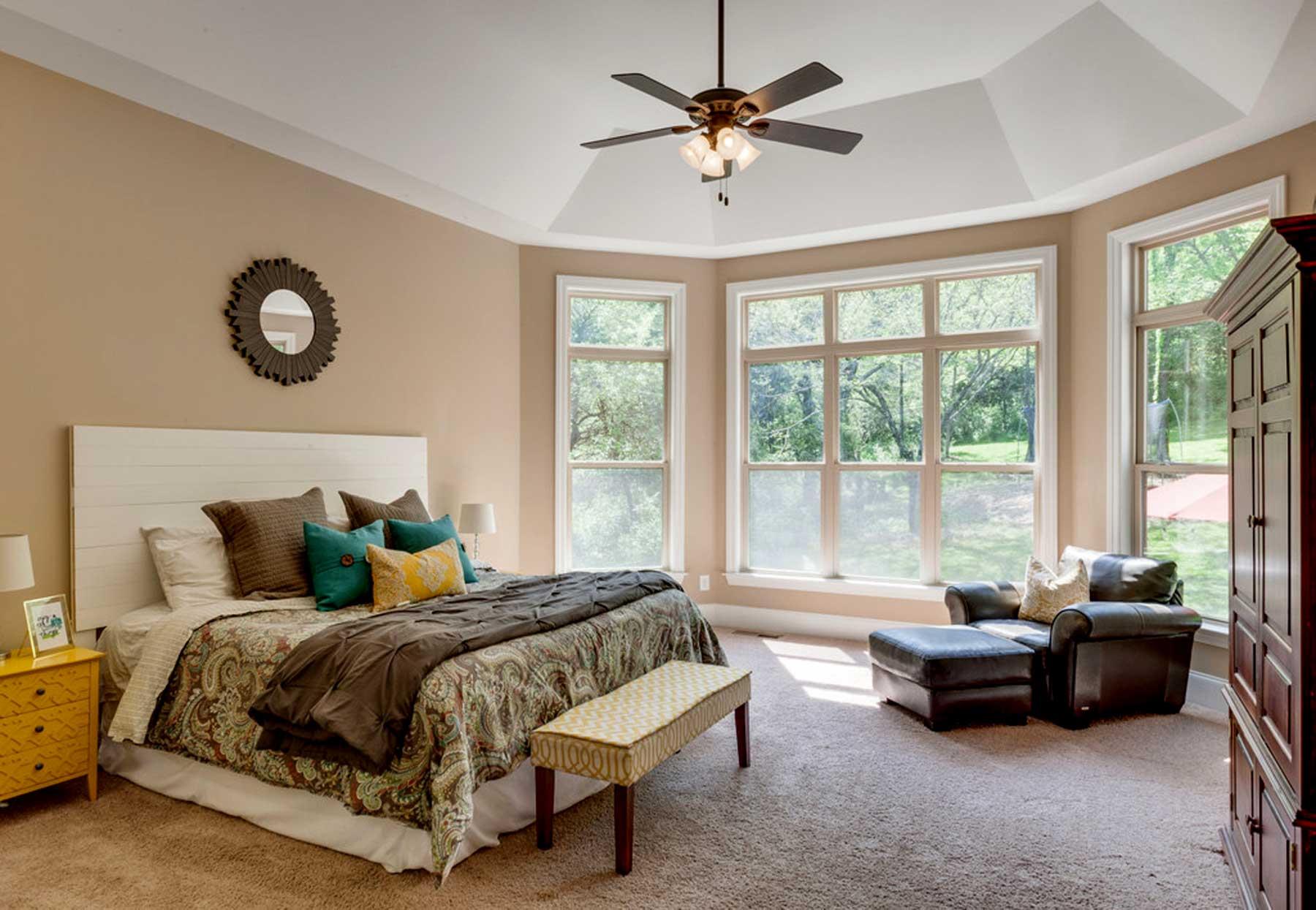 3421 Herbert Drive Franklin, TN 37067 - Photo 23 of 30 a spacious bedroom with a bed a couch and a large window