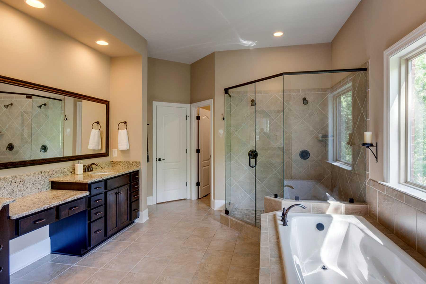 3421 Herbert Drive Franklin, TN 37067 - Photo 25 of 30 a spacious bathroom with a tub sink shower and mirror