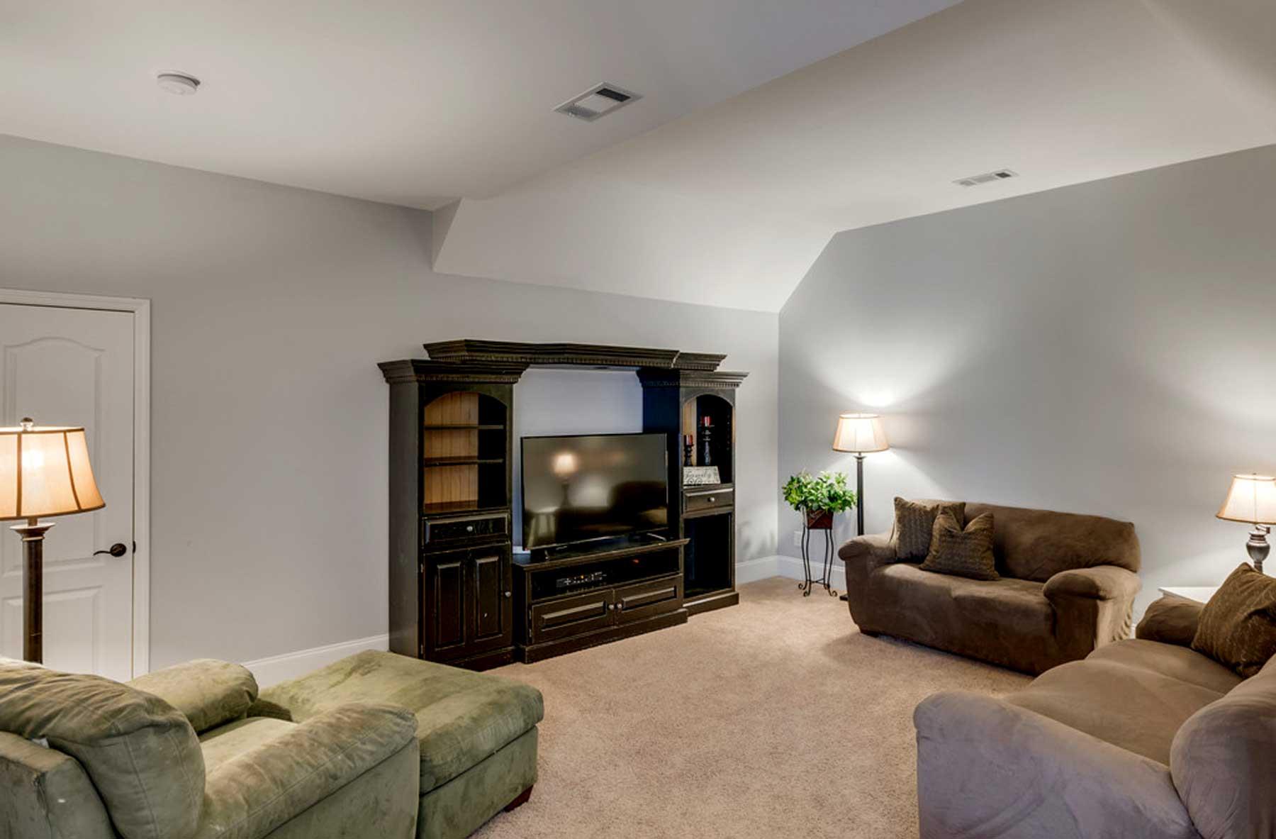 3421 Herbert Drive Franklin, TN 37067 - Photo 27 of 30 a living room with furniture and a flat screen tv