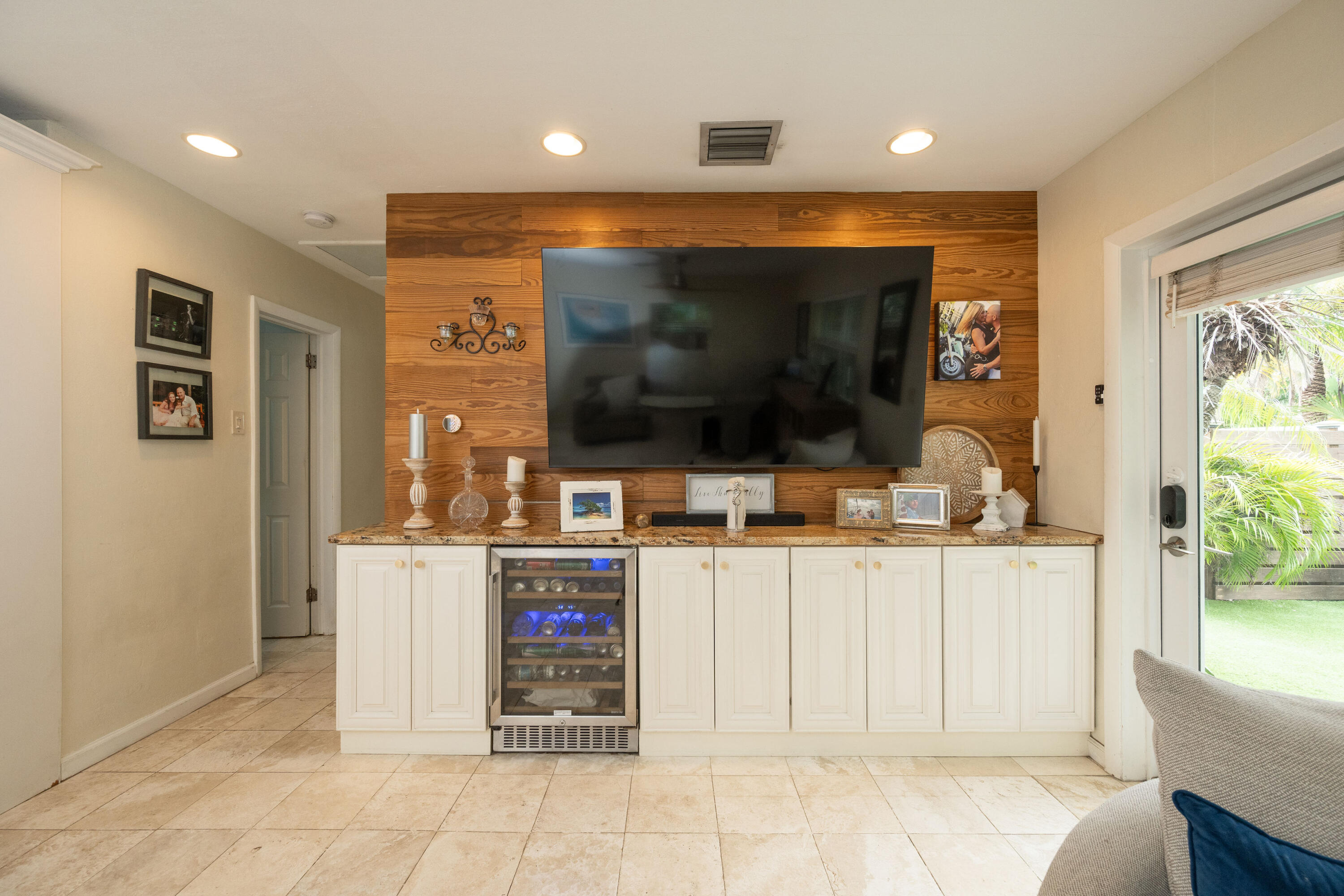 1523 Seminary Street Key West, FL 33040 - Photo 11 of 38 a living room with stainless steel appliances furniture and a flat screen tv
