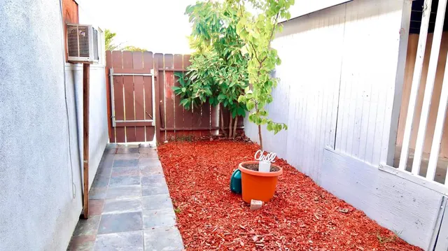 a view of a balcony with chairs