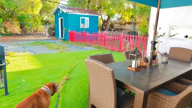 a view of swimming pool with seating space