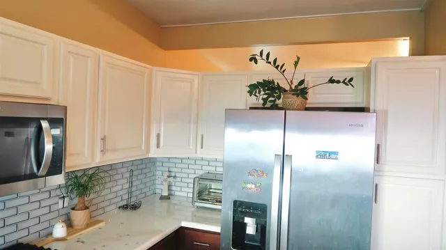 a view of kitchen with a sink
