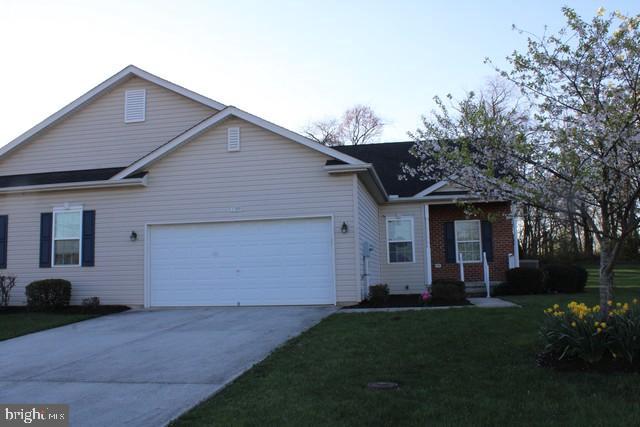 3309 Portrait Way Chambersburg, PA 17202 - Photo 1 of 16 a front view of house with a garden