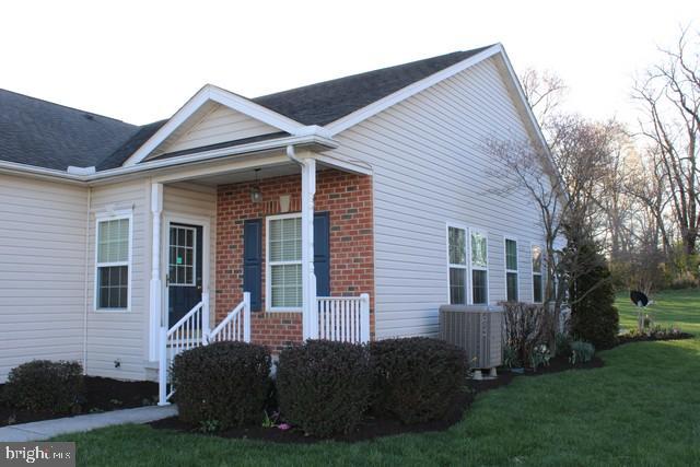 3309 Portrait Way Chambersburg, PA 17202 - Photo 16 of 16 a front view of a house with a yard