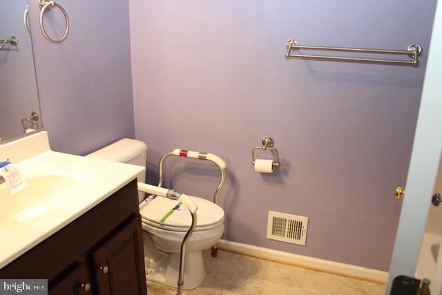 3309 Portrait Way Chambersburg, PA 17202 - Photo 8 of 16 a bathroom with a sink vanity mirror and toilet