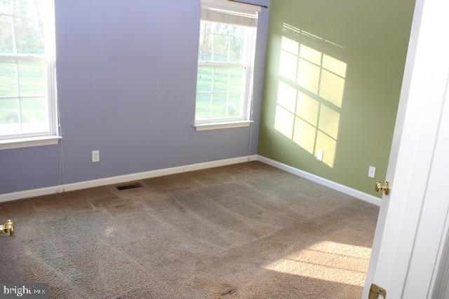 3309 Portrait Way Chambersburg, PA 17202 - Photo 9 of 16 an empty room with windows