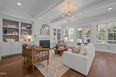 a kitchen with stainless steel appliances sink a microwave and cabinets