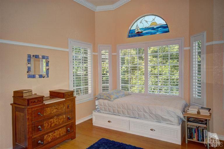761 Coronado Place Oxnard, CA 93030 - Photo 18 of 27 a bedroom with a bed and a window