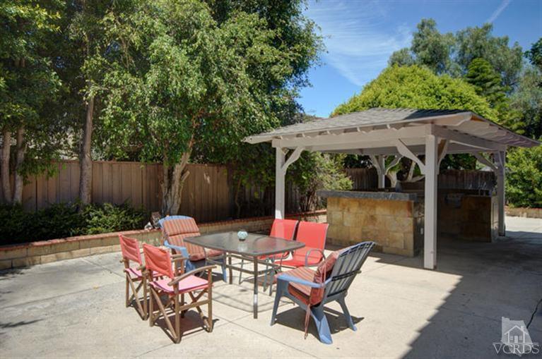 761 Coronado Place Oxnard, CA 93030 - Photo 25 of 27 a view of backyard with seating space and wooden fence