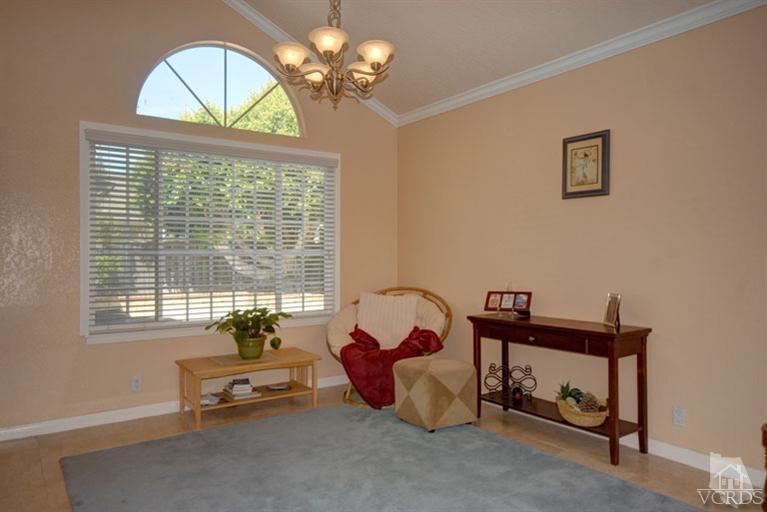 761 Coronado Place Oxnard, CA 93030 - Photo 9 of 27 a living room with furniture and a window