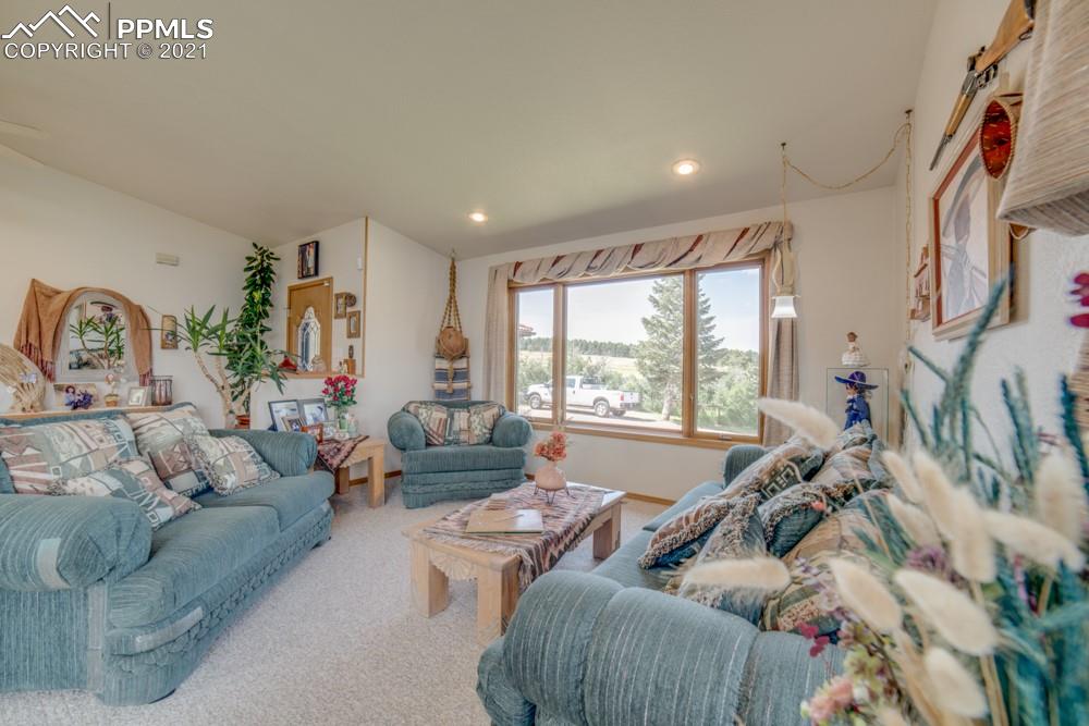 10624 Baxter Road Rye, CO 81069 - Photo 14 of 50 a living room with furniture and a large window