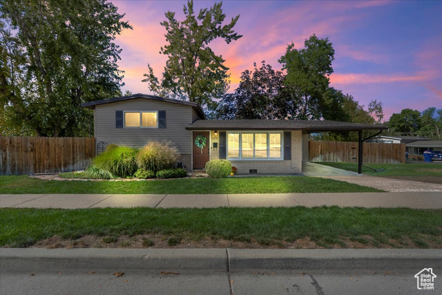6378 Meadowcrest Road East Holladay, UT 84121 - Photo 1 of 1 Split level home with an attached carport and mountain views.