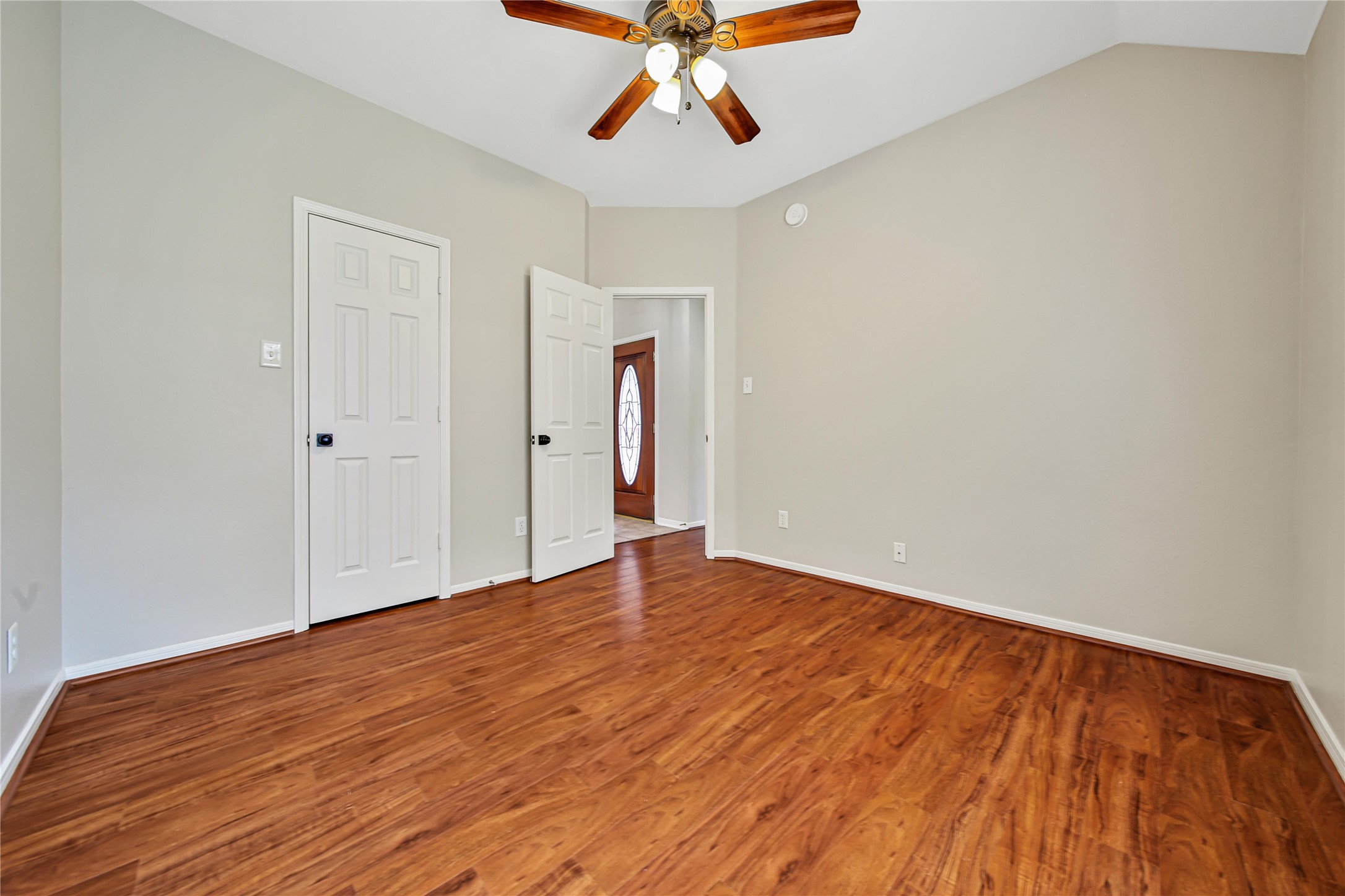 14526 Red Tailed Hawk Lane Houston, TX 77044 - Photo 28 of 40 wooden floor in an empty room with a window
