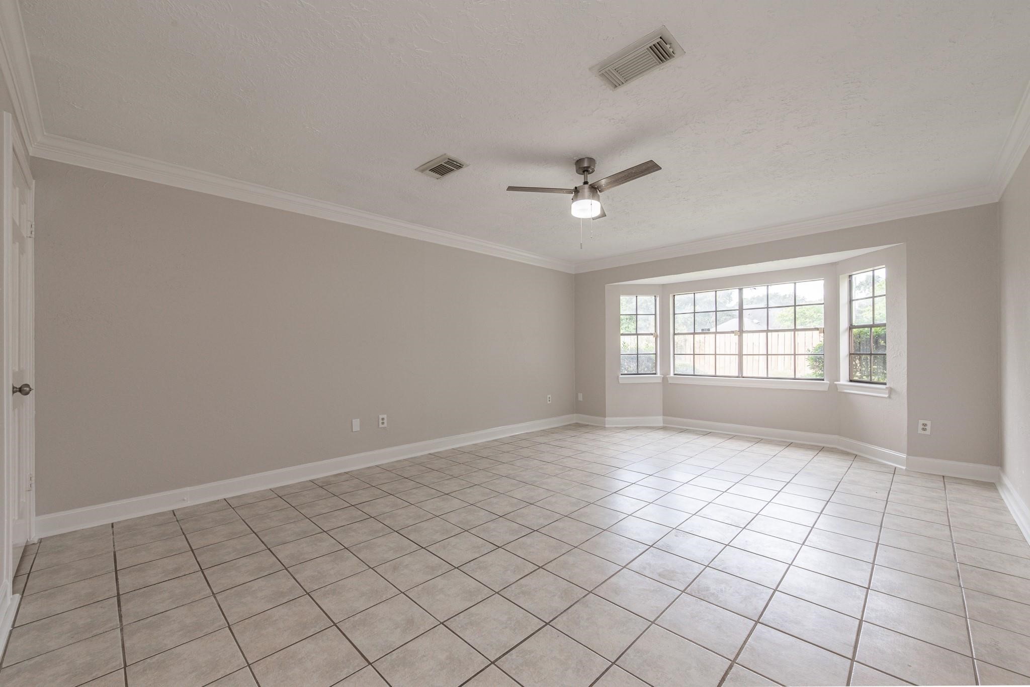 8019 Beaufort Drive Spring, TX 77379 - Photo 23 of 47 a view of an empty room with a window