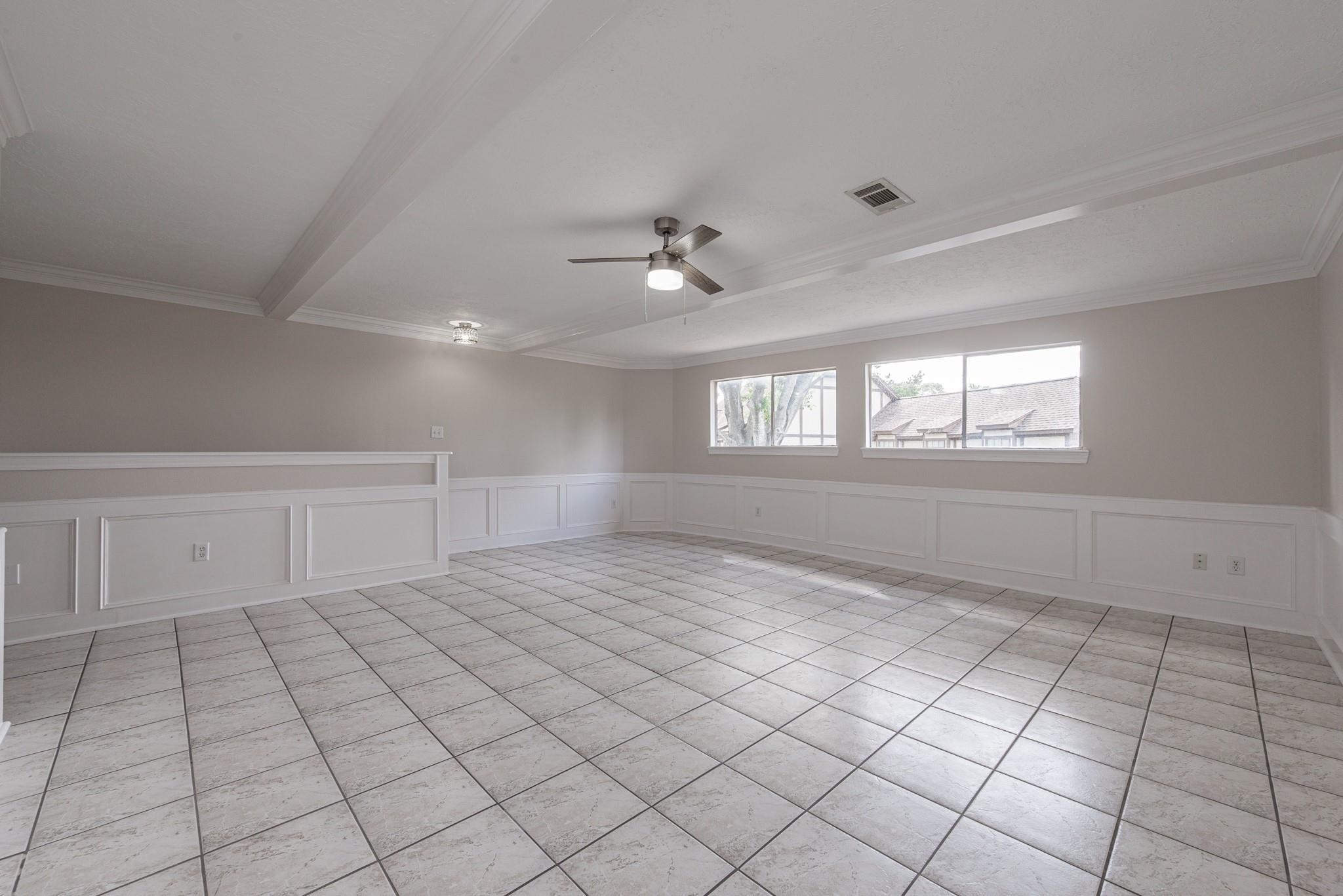 8019 Beaufort Drive Spring, TX 77379 - Photo 41 of 47 an empty room with windows and fan