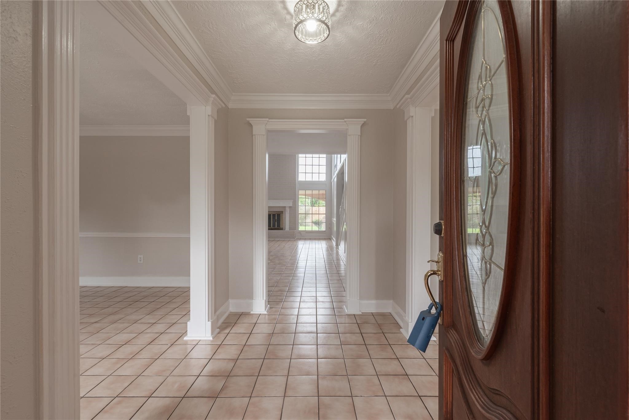 8019 Beaufort Drive Spring, TX 77379 - Photo 5 of 47 a view of a hallway with wooden floor and a bathroom