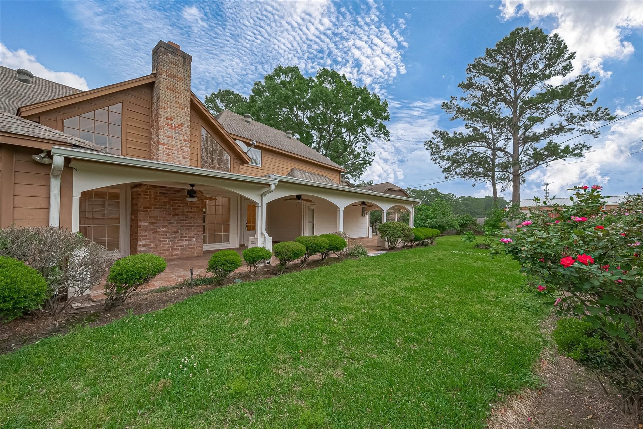 8019 Beaufort Drive Spring, TX 77379 - Photo 7 of 47 a front view of a house with garden