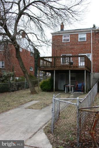 641 Brisbane Road Baltimore, MD 21229 - Photo 9 of 24 a view of house with car parked on road