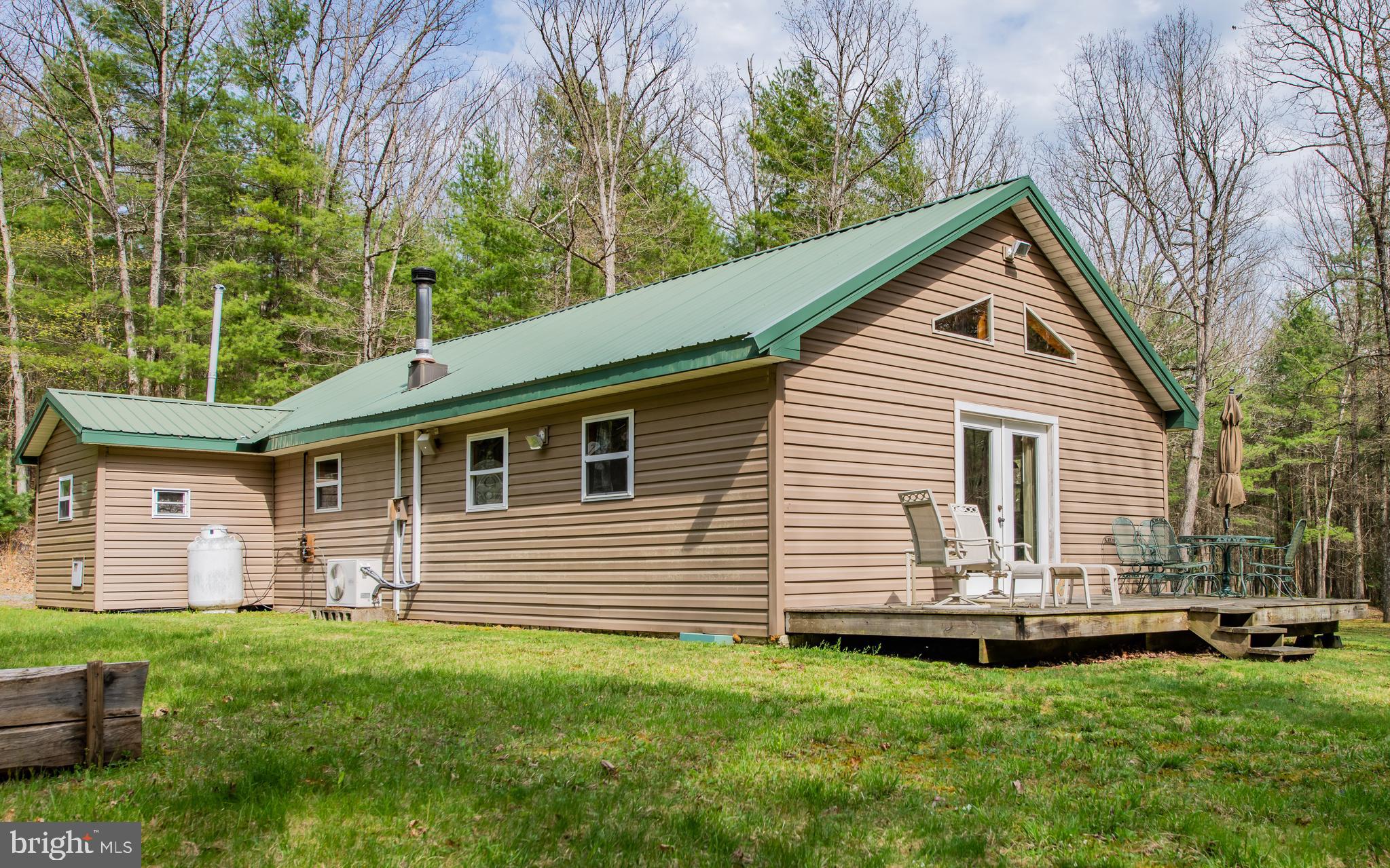 220 Gillens Road Mill Hall, PA 17751 - Photo 2 of 37 a front view of a house with a garden