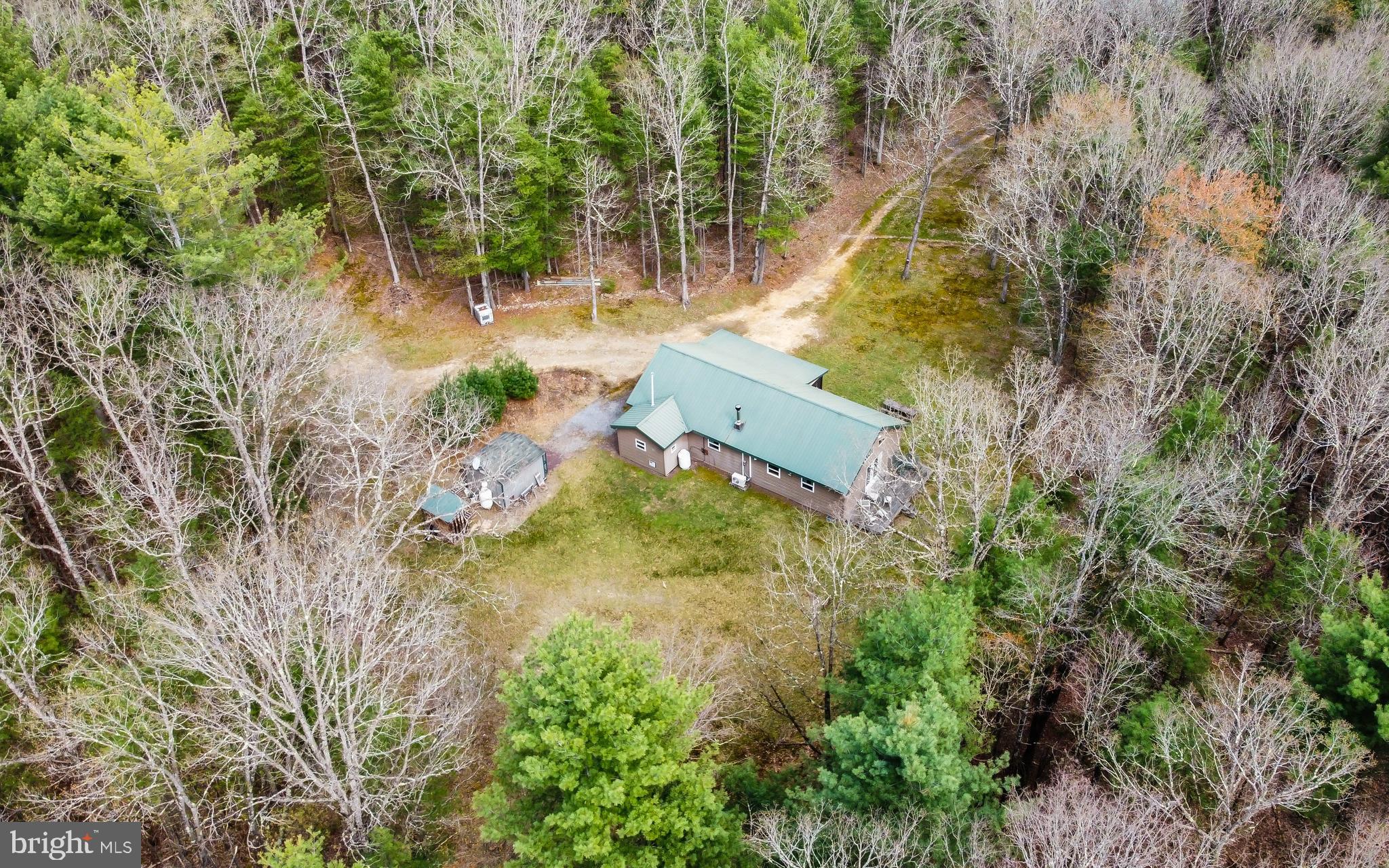 220 Gillens Road Mill Hall, PA 17751 - Photo 4 of 37 a aerial view of a house with swimming pool