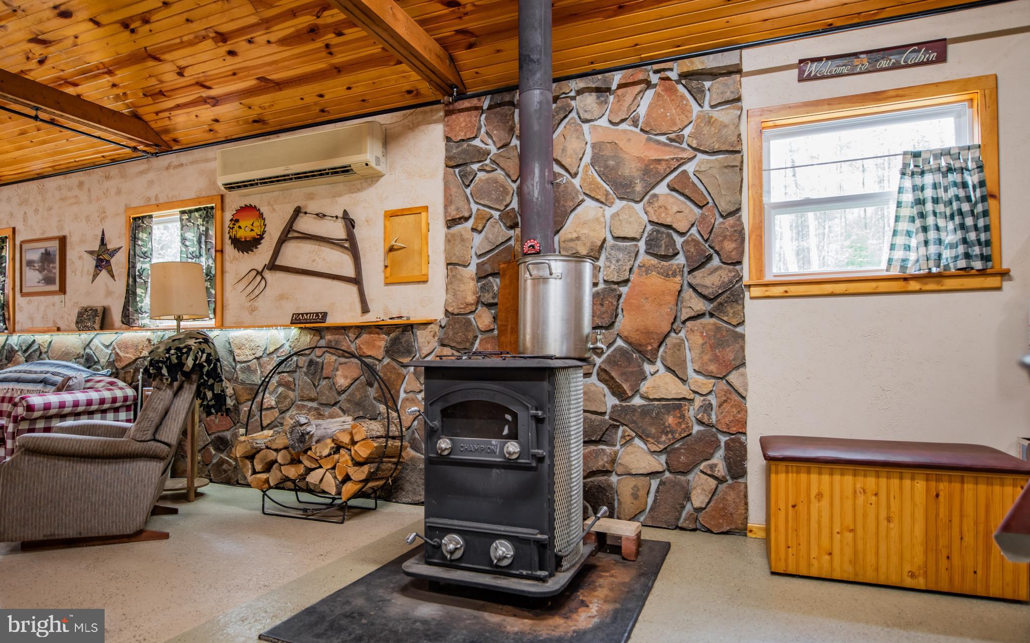 220 Gillens Road Mill Hall, PA 17751 - Photo 9 of 37 a living room with fireplace furniture and a window