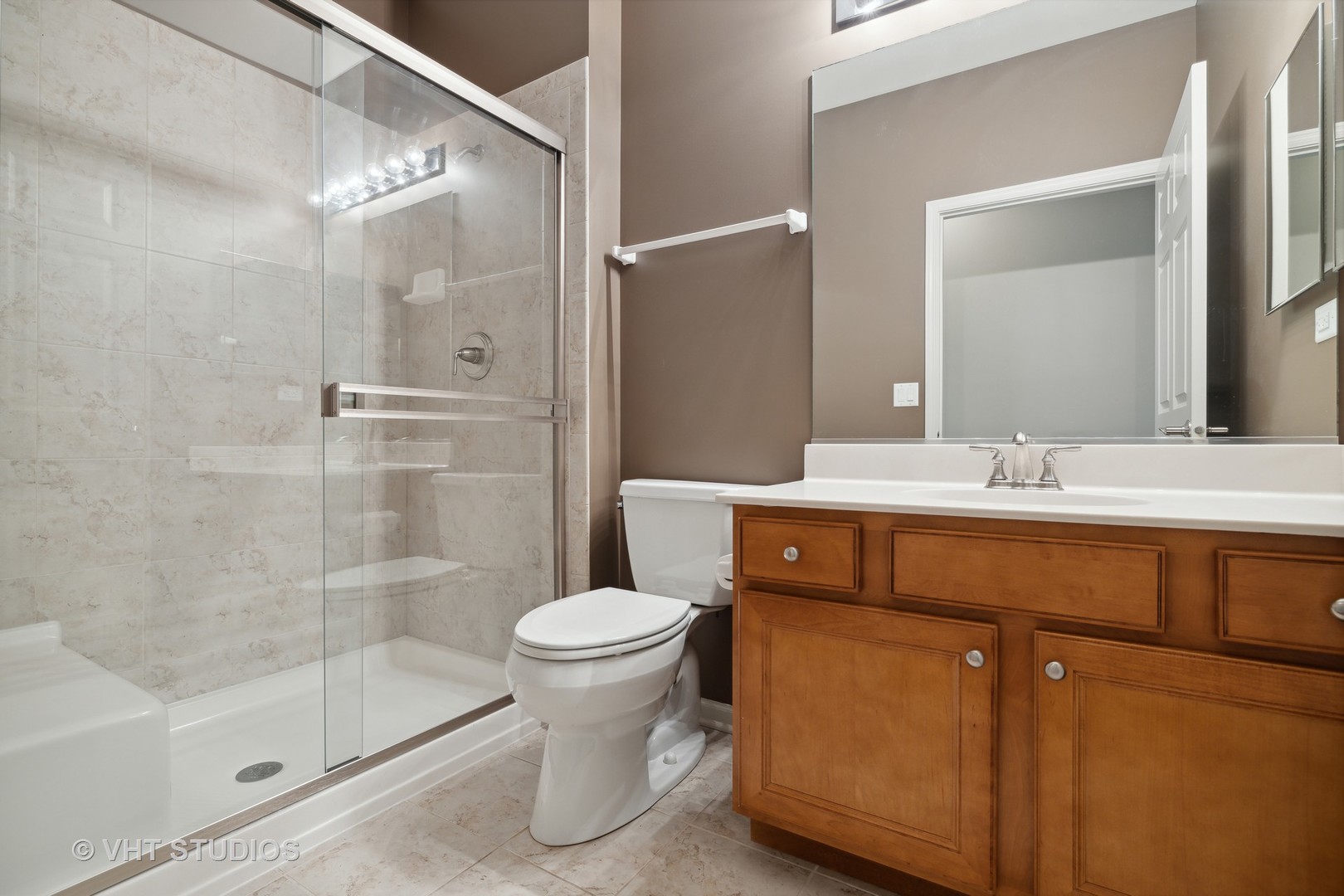 2944 Normandy Circle Naperville, IL 60564 - Photo 16 of 38 a bathroom with a sink and a mirror