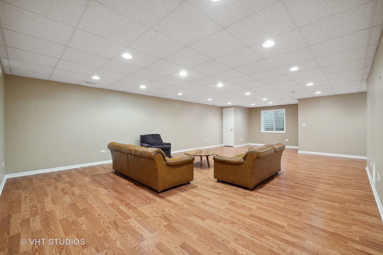 2944 Normandy Circle Naperville, IL 60564 - Photo 20 of 38 a living room with furniture and a wooden floor
