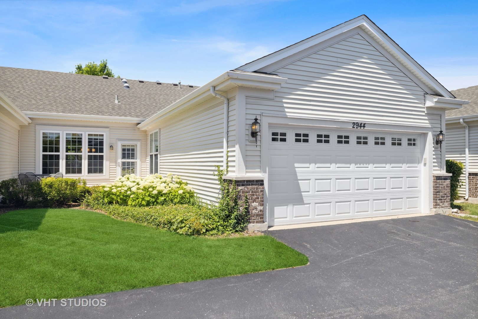 2944 Normandy Circle Naperville, IL 60564 - Photo 25 of 38 a front view of a house with a yard and garage