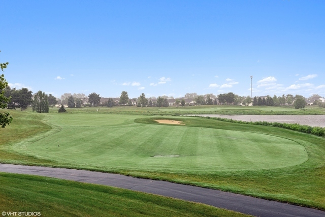 2944 Normandy Circle Naperville, IL 60564 - Photo 34 of 38 a view of a lake with a big yard
