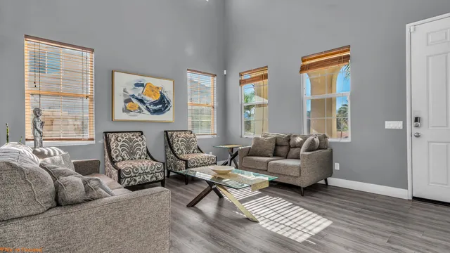 a living room with furniture and a window