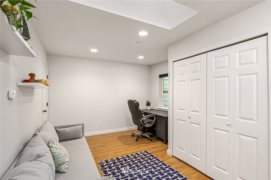 21325 11th Drive Southeast Bothell, WA 98021 - Photo 17 of 27 a view of room with furniture and wooden floor