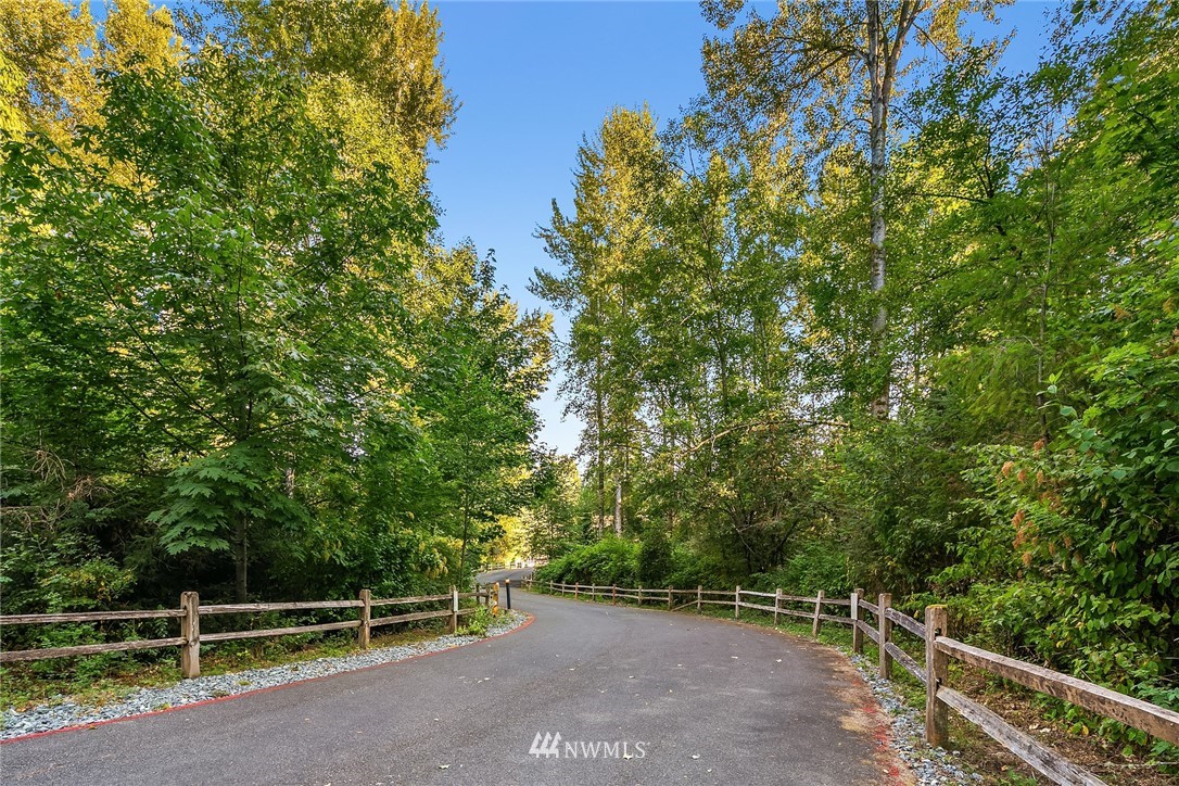 21325 11th Drive Southeast Bothell, WA 98021 - Photo 27 of 27 a view of a yard with an outdoor and trees