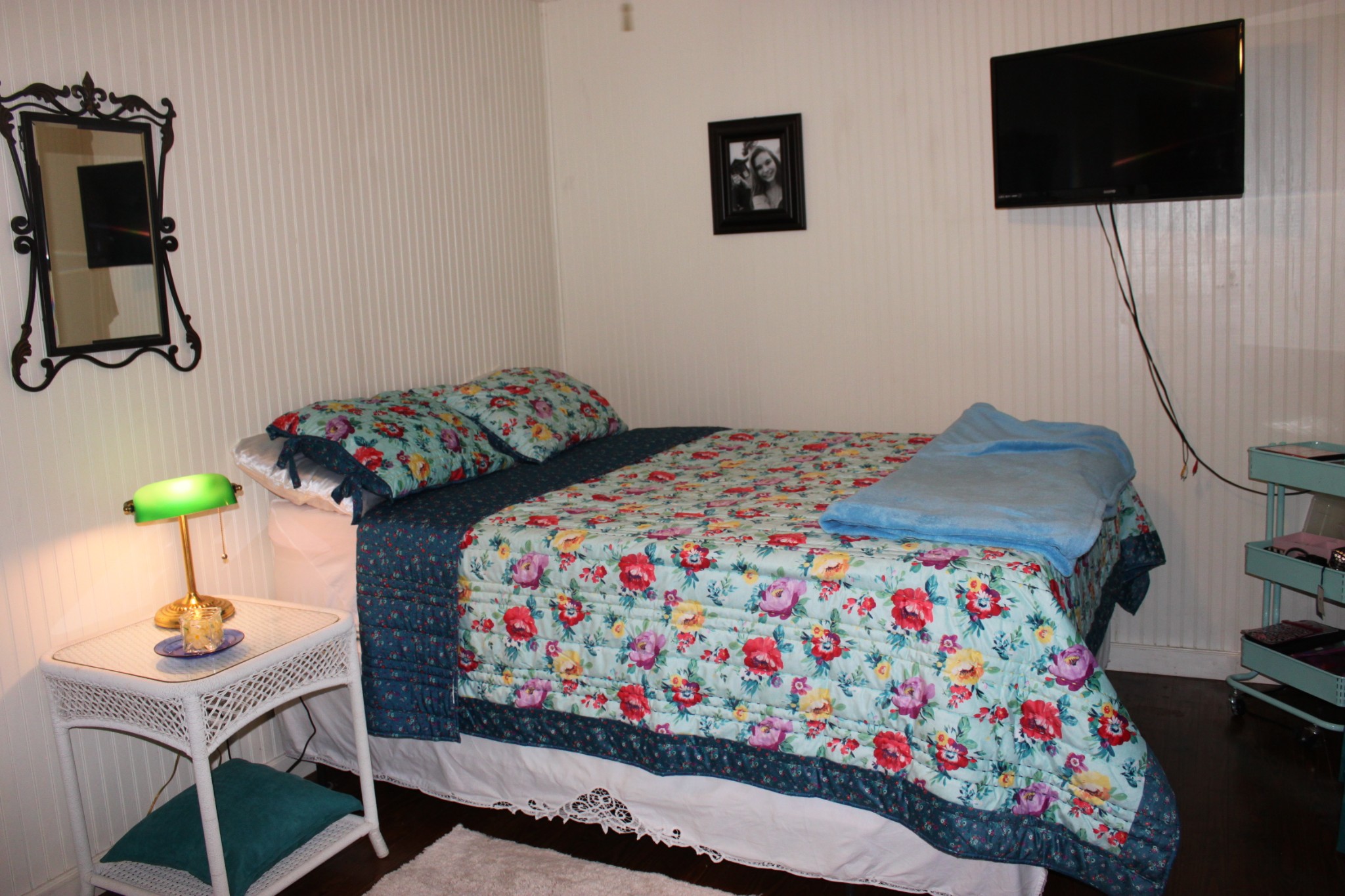 808 Cedar Mountain Road Decherd, TN 37324 - Photo 22 of 39 a bedroom with a bed and a flat screen tv